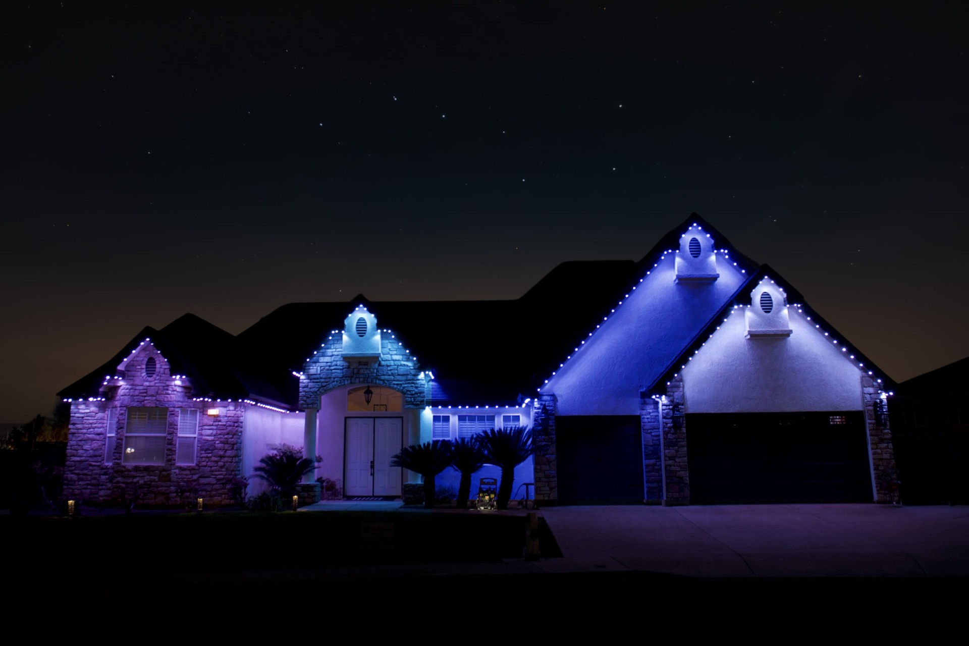 Home washed in soft purple and blue bluEmber Easter lighting