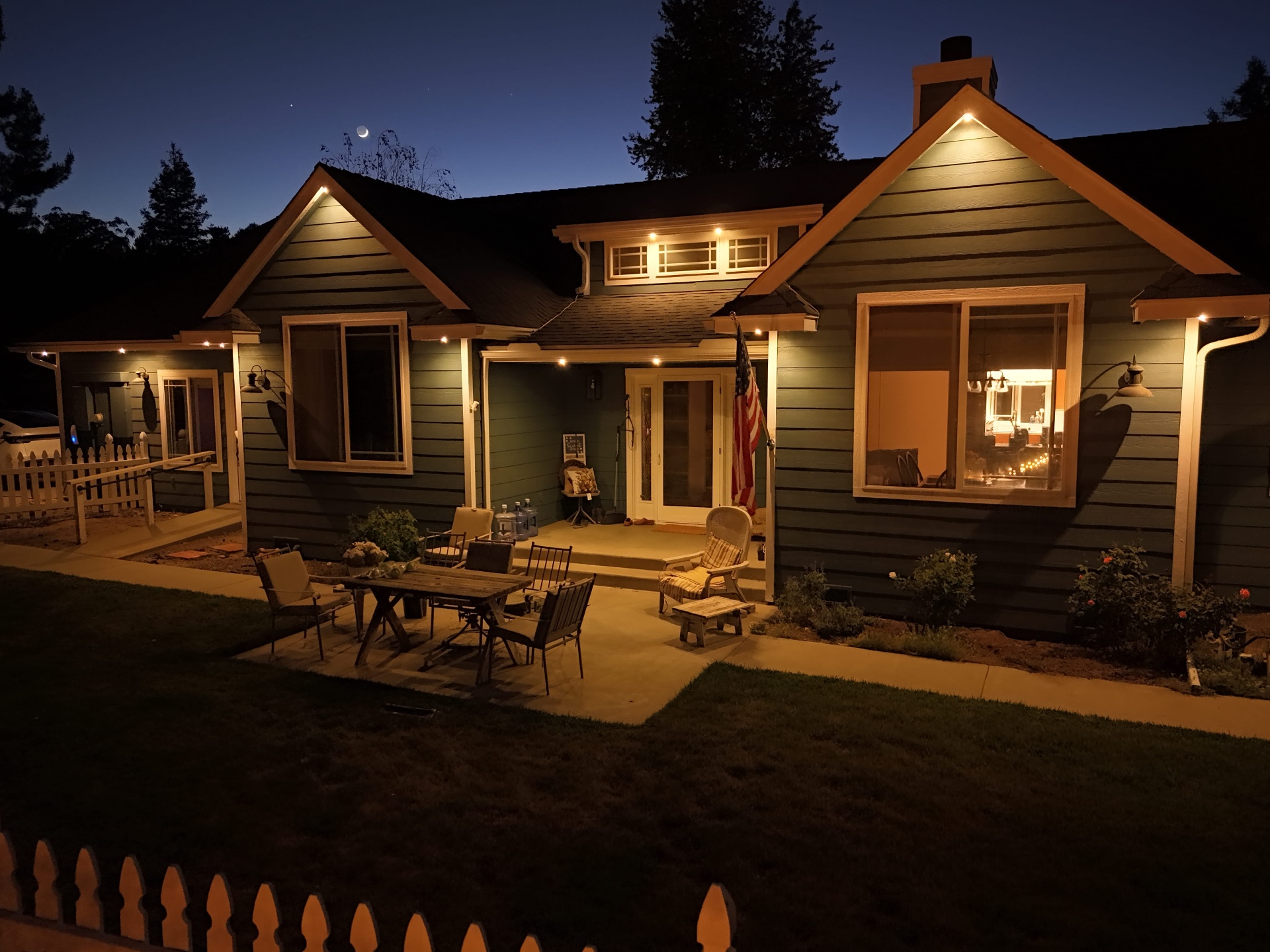 Craftsman home in a warm bluEmber overnight lighting scene